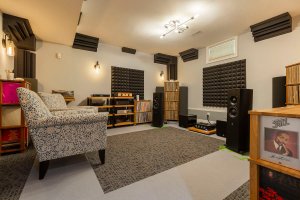 Custom-designed acoustic basement renovation for a home music studio in Toronto with soundproofing panels and high-fidelity audio equipment.