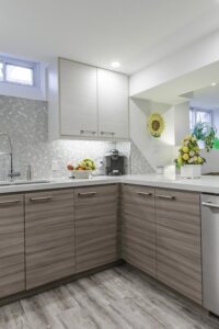 Kitchen Storage Wall with Fridge and Counter Run from a real Capable Group kitchen renovation.