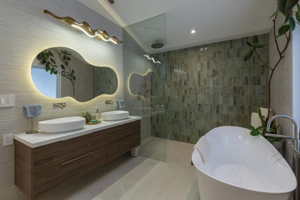 Completed Richmond Hill primary bathroom with freestanding tub, double vanity and glass shower